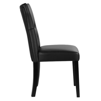 Two black PU leather dining chairs with buttons 92cm H
