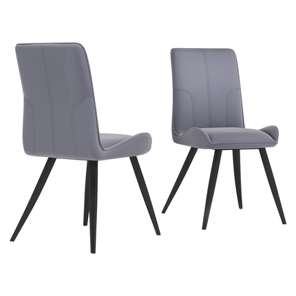 Two dining chairs in a grey set with velvet upholstery